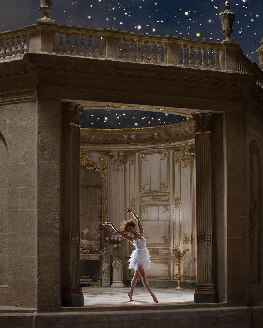 Ballet dancer dancing in the entranceway of a Baroque pavilion (made by Mulvany & Rogers), the ceiling open to stars in the night sky above.